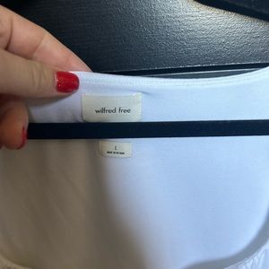 Aritzia Blouse size large in white